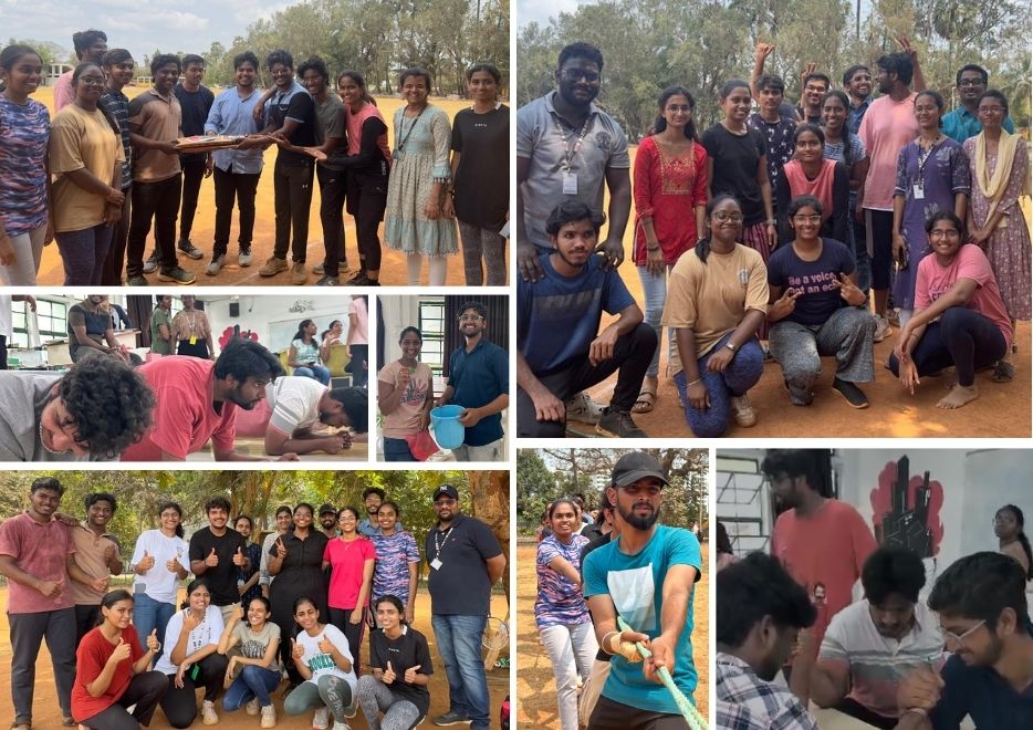 Two men in bicycle jerseys sitting outside at table having coffee